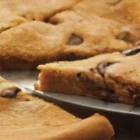 Family Style Pizza Cookie · A warm, melted chocolate chip cookie dessert for the whole family.
