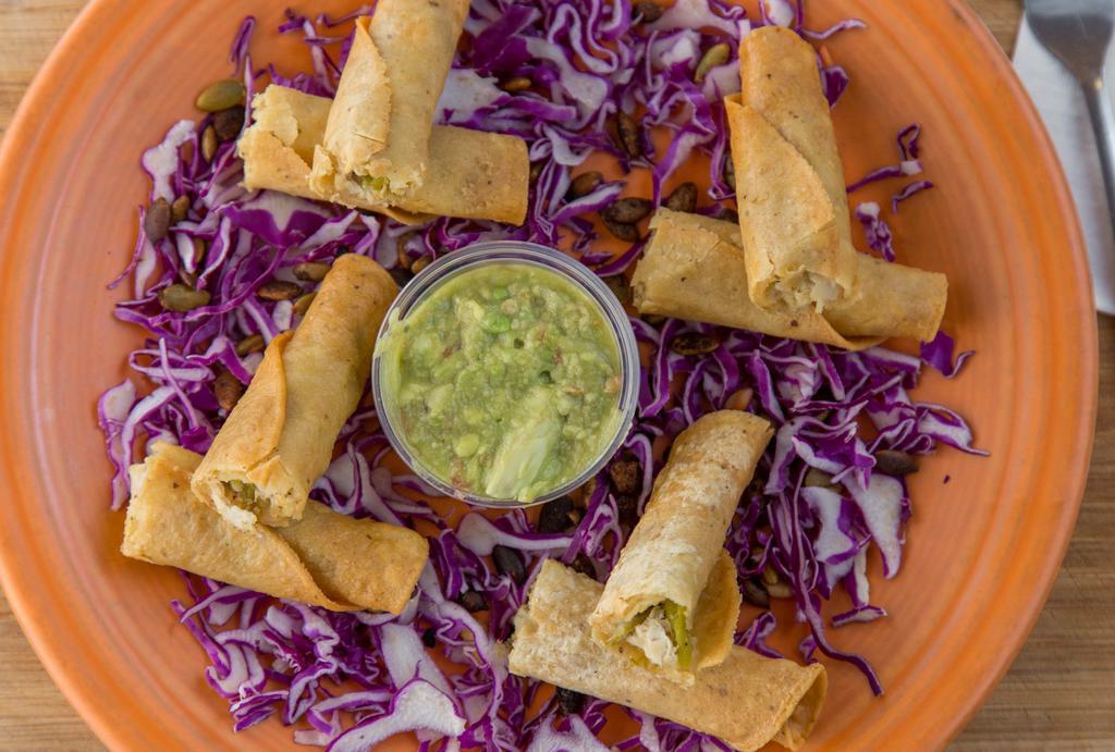 Sedona Taquitos · Four seasoned pulled chicken taquitos with green chile-pumpkin seed sauce and salsa.