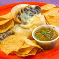 Bean & Cheese Burrito · Creamy anasazi or whole black beans inside a warm flour tortilla with jack and cheddar chees...