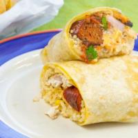 Paella Burrito · Flour tortilla, two grilled shrimp, mahi mahi, rice, cheese, new Mexican chicken sausage, re...