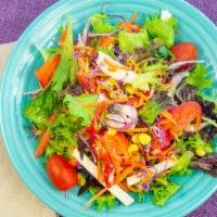 Southwest Dinner Salad · Mixed salad, corn, jicama, red onion, tomatoes and 1 oz. Southwestern vinaigrette served on ...