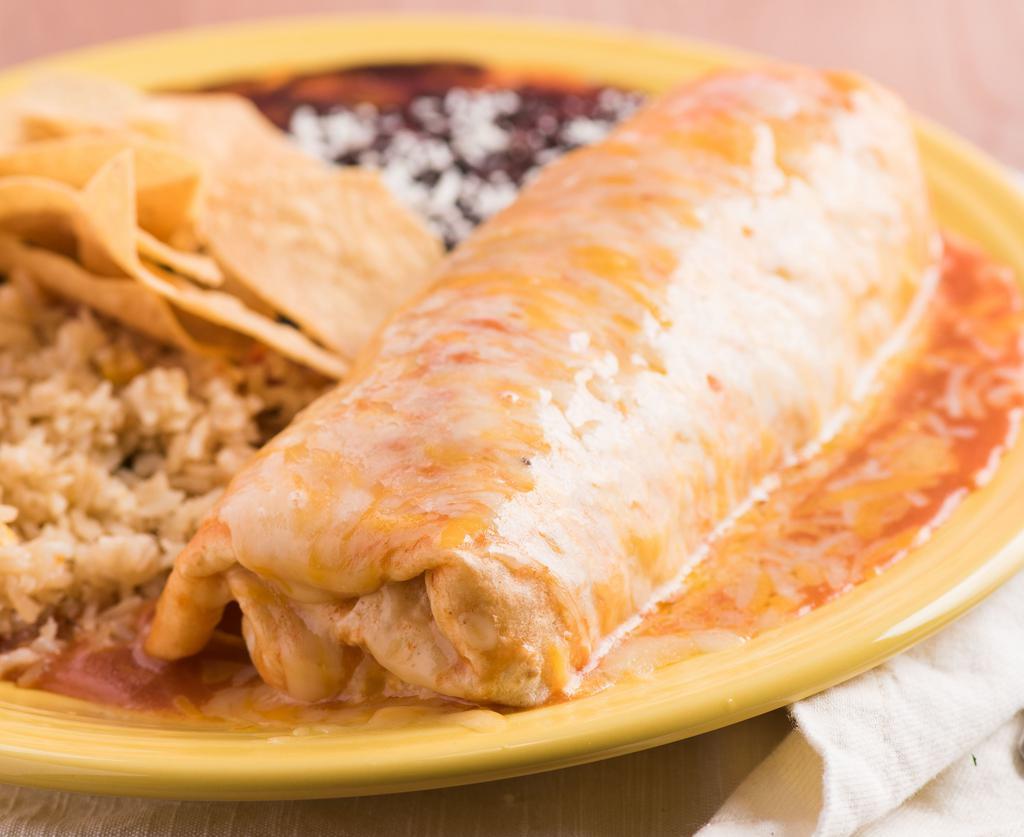 Ranchero Burrito Plate · Southwest burrito with your choice of meat or vegetarian, baked with ranchero sauce and melted cheese.