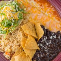 Taco & Enchilada Plate · Choice of red or green Chile or ranchero sauce with melted jack and cheddar cheese.