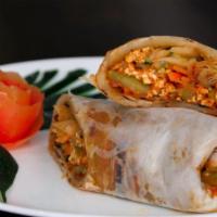 CHICKEN KATI ROLL · Chicken with spices wrapped in a paratha bread