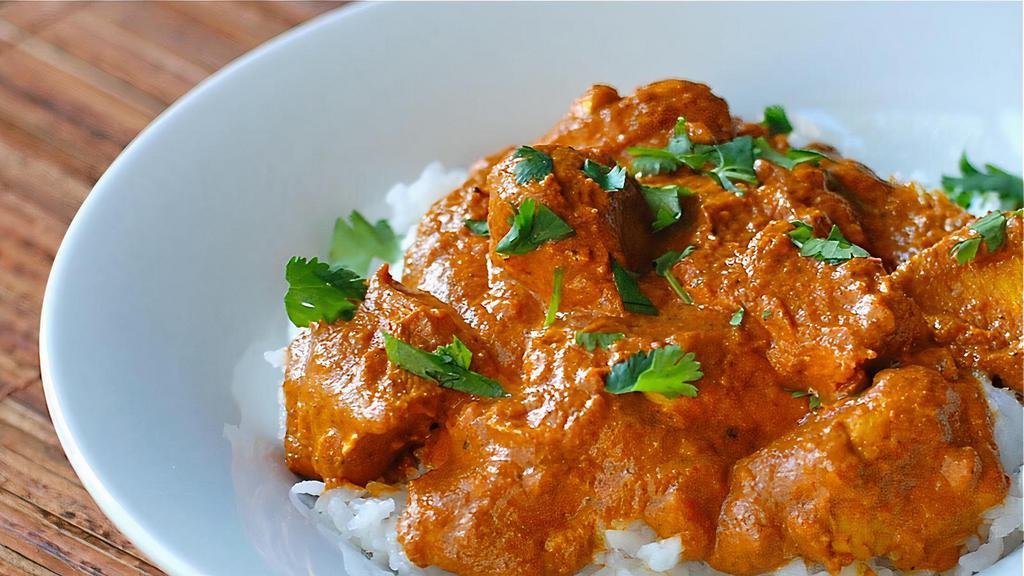 Chicken Tikka Masala · Tender boneless chicken roasted in tandoor (clay oven) and then cooked without signature butter cream and tomato sauce.