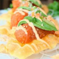 Spicy Tuna Bites · 3 pieces of fresh spicy tuna on crispy wonton pieces with avocado and green onions, drizzled...
