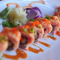 Oishi Roll · Shrimp tempura, cucumber, red tobiko, baked spicy crab topped with oishi sauce, scallions an...