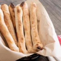 Breadsticks · Our famous pizza dough breadsticks, baked golden brown.