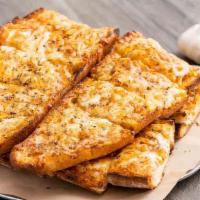 Mozzarella Garlic Bread · Sourdough covered with garlic butter, oregano, paprika and mozzarella, melted to perfection.