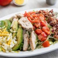 Cobb Salad · Sliced chicken breast, crispy thick-cut pepper bacon, blue cheese crumbles, hard-boiled egg,...