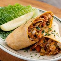 Buffalo Chicken Wrap · Crispy chicken, lettuce, red onion, tomatoes and crunchy tortilla strips, tossed with spicy ...
