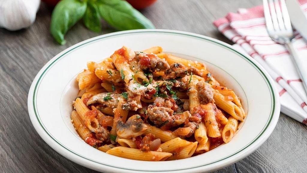 Penne With Italian Sausage · Mild Italian sausage sautéed with mushrooms, red onions, garlic and Italian parsley, mixed with penne pasta and homemade marinara sauce.