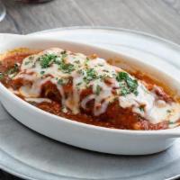 Meat Lasagna · Lasagna noodles layered with mild Italian sausage, salami, pepperoni, spinach, mozzarella an...