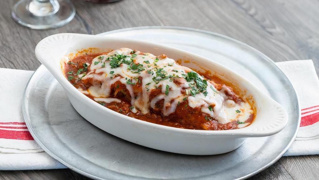 Meat Lasagna · Lasagna noodles layered with mild Italian sausage, salami, pepperoni, spinach, mozzarella and ricotta, topped with classic meat sauce and melted mozzarella.
