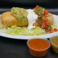 Chimichanga (deep fried burrito) · Flour tortilla, rice, beans your choice of meat, salsa, sour cream, topped with pico de gall...