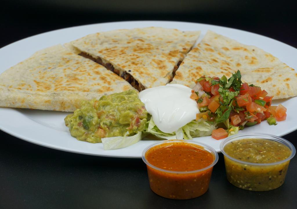 Super  Quesadilla · Flour tortilla, cheese your choice of meat. Lettuce sour cream and pico de gallo on the side.