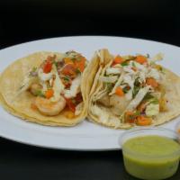 Pacifico Taco · Corn tortilla, fish or shrimp, cabbage salad and chipotle sauce.