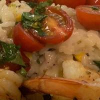 Risotto Gamberoni · jumbo prawns, arborio rice, yellow corn, lemon zest, thyme, cabo tomatoes