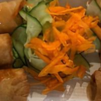 Shrimp Rolls · With cucumber salad and Asian sauces
