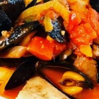 Black Mussels · sauteed with chorizo, fennel, and garlic in a spicy marinara sauce