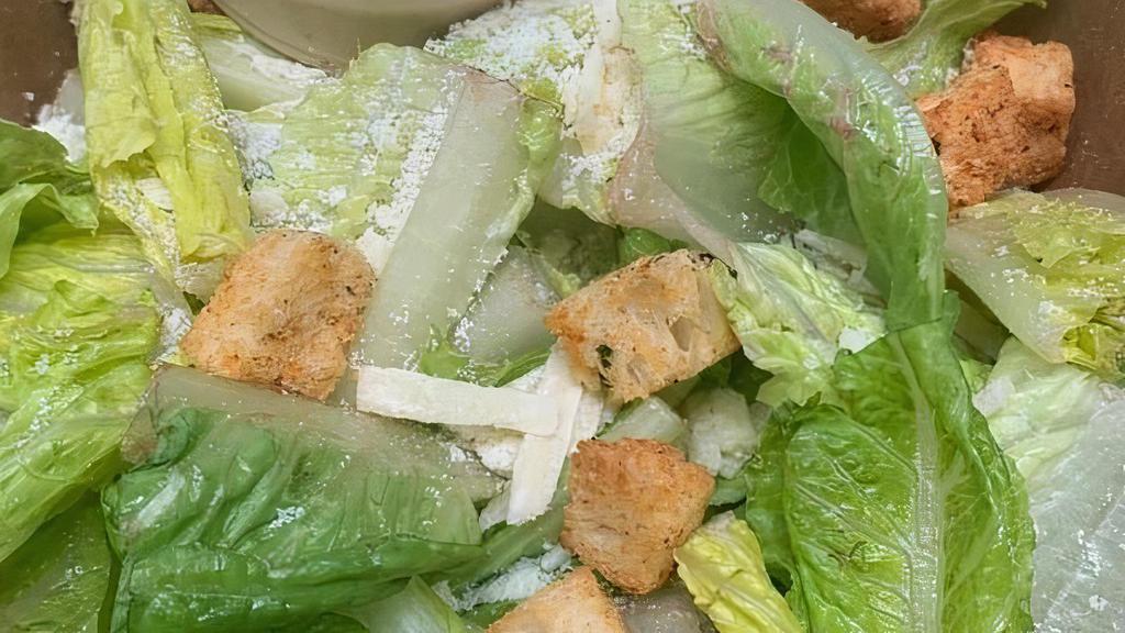 Family Style Insalata Cesare · Romaine, anchovies, parmesan cheese, garlic croutons