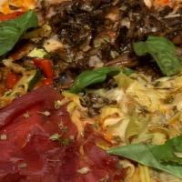 Pizza Quattro Stagione · mozzarella, mushrooms, sausage, prosciutto and artichokes