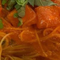 Capellini · Naturale Angel hair pasta with fresh tomato sauce, garlic and basil