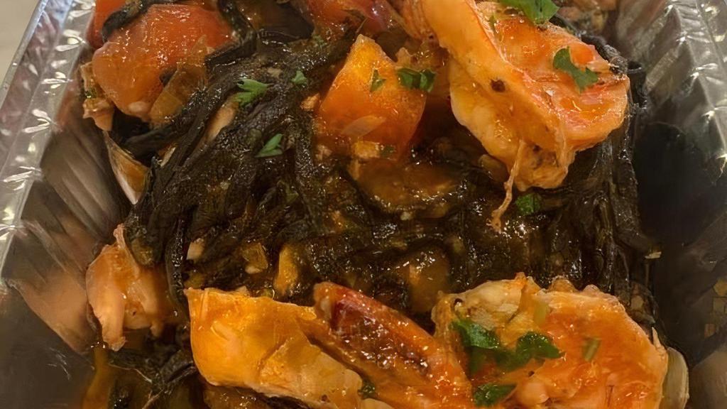Squid Ink Linguini · fresh fish, clams, mussels, prawns, spicy marinara sauce