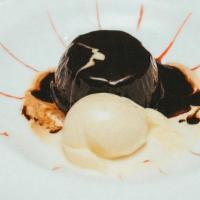 Chocolate Lava Cake · Served with raspberry, chocolate sauce and vanilla bean gelato