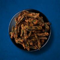 Okra Fry · Diced fresh okra, stir-fried with onions, garlic, and spices till crisp.