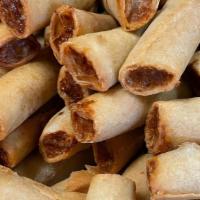 PORK Lumpia Shanghai · Served with Spicy Sweet & Sour sauce or Cane Vinegar Garlic dipping sauce.