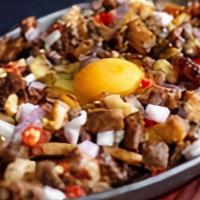 Sizzling Chicken Sisig · Sisig has been one of the best creations in Filipino cuisine. Marinated with ginger, onions,...