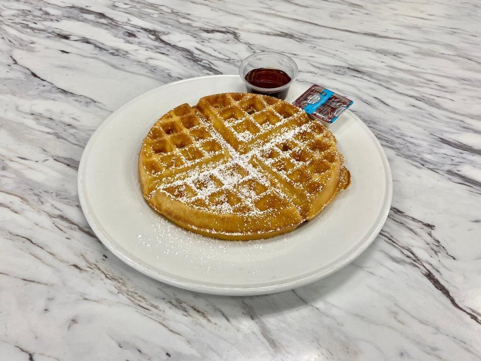 BELGIAN WAFFLE · Belgian waffle, powdered sugar, butter and syrup.