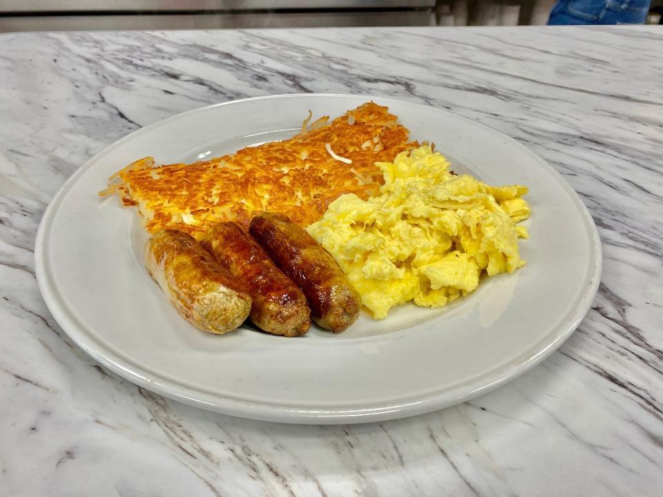 SAUSAGE & EGGS · Three large sized sausage links, two eggs any style, hash browns, pancakes or toast.