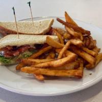 GRILLED B.L.T. · Bacon, lettuce, tomato, mayonnaise, grilled sourdough, French fries.