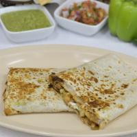 RANCHO GRANDE QUESADILLA · With sour cream, guacamole, cheese, and choice of meat.
