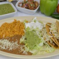2 CRISPY TACO PLATE · 2 Crispy taco with your choice of meat