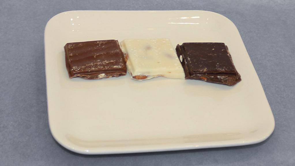 Almond Bark · 1 pc. Roasted almonds covered in chocolate (milk, dark, white)
