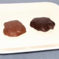 Mini Pecan Turtle · 1pc. Pecan, caramel, chocolate.  (milk, dark)