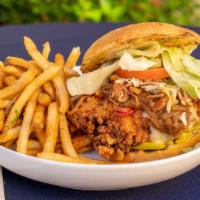 Fat Cat Fried Chicken Sandwich · Buttermilk Fried Chicken Breast stacked on a Acme Roll with pepperoncinis, swiss cheese, fri...