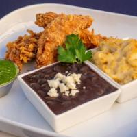Buttermilk Fried Chicken · Lightly fried buttermilk marinated chicken breast tenders served with chipotle coconut black...