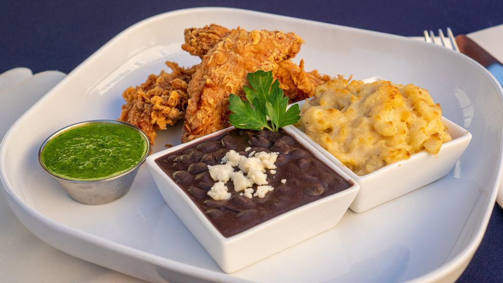 Buttermilk Fried Chicken · Lightly fried buttermilk marinated chicken breast tenders served with chipotle coconut black beans, chef Kathy's mac and cheese and chimichurri vinaigrette.