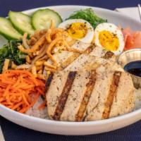 Rice Bowl: Marinated & Grilled Tofu · Marinated and grilled tofu served with vegetarian fried rice, soft boiled egg, pickled carro...