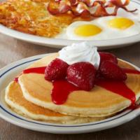 Create Your Own Pancake Combo · Choice of any 2 same-flavored pancakes, served with 2 eggs* your way, 2 bacon strips or 2 po...