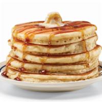 Original Buttermilk Pancakes - Short Stack · A 3-stack of our world-famous buttermilk pancakes topped with whipped real butter.