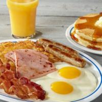 Breakfast Sampler · Two eggs* your way, 2 bacon strips, 2 pork sausage links, 2 thick-cut pieces of ham, hash br...