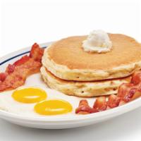2 X 2 X 2 · Two eggs* your way, 2 bacon strips or 2 pork sausage links & 2 buttermilk pancakes.