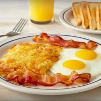 Quick 2-Egg Breakfast · Two eggs* your way, hash browns, 2 bacon strips or 2 pork sausage links & toast.