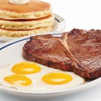 T-Bone Steak & Eggs · T-Bone steak* grilled & served with 3 eggs* your way & 3 buttermilk pancakes.