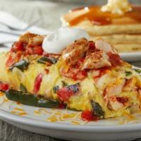 Chicken Fajita Omelette · Grilled chicken breast with Poblano & red bell peppers, roasted onions & Jack & Cheddar. Ser...
